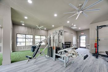 Fitness center with multi station weight machine